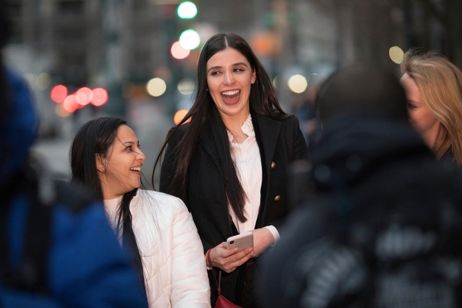 Emma Coronel Aispuro, center, leaves a Brooklyn federal court in New York after attending the trial of her husband Joaquin "El Chapo" Guzman on Jan 17, 2019. (Kevin Hagen / Associated Press)