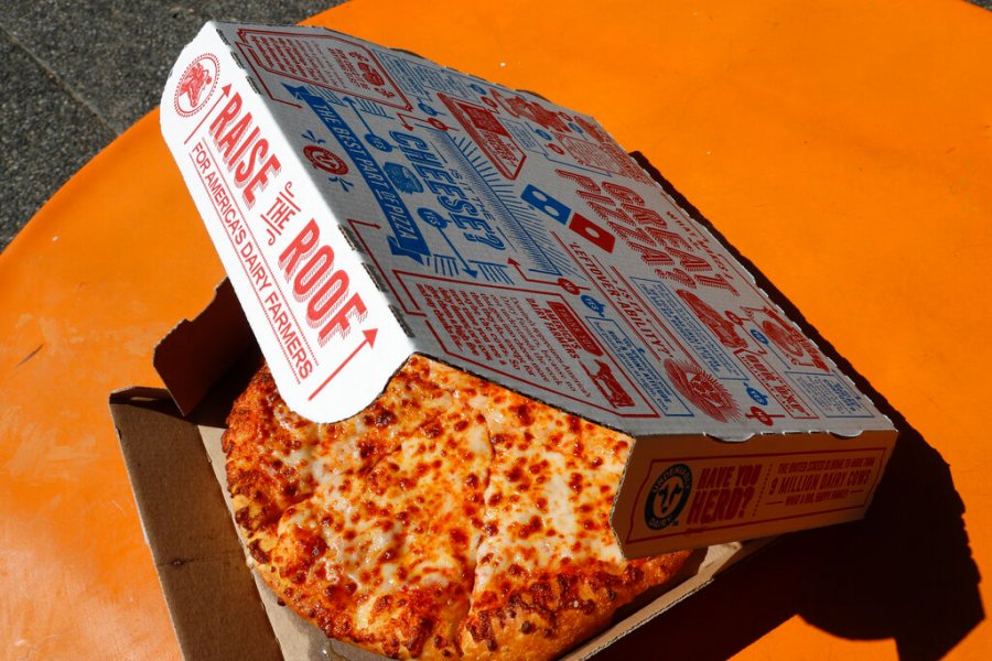 This July 15, 2019, file photo shows a small Domino's pizza made in a Domino's Pizza shop in downtown Pittsburgh. (AP Photo/Gene J. Puskar, File)