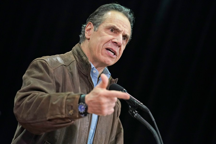 In this Wednesday, Feb. 24, 2021, file photo, New York Gov. Andrew Cuomo speaks during a press conference before the opening of a mass COVID-19 vaccination site in the Queens borough of New York. A former aide’s allegations that Gov. Cuomo subjected her to an unwanted kiss during years of sexual harassment have spurred calls for an investigation — and questions about who might meaningfully conduct one. (AP Photo/Seth Wenig, Pool, File)