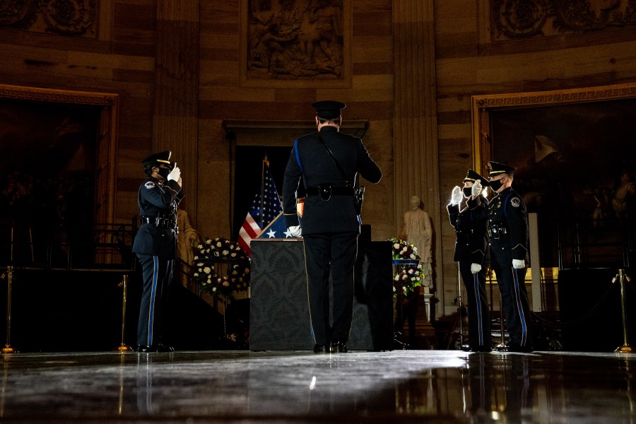 Capitol Police Officers pay their respects to late U.S. Capitol Police Officer Brian Sicknick as he lies in honor in the U.S. Capitol Rotunda on Feb. 2, 2021. (Erin Schaff / AFP / Getty Images)