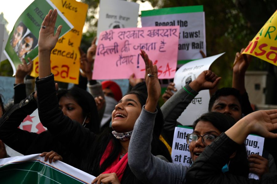 Demonstrators take part in a march organized in support of farmers protesting against the central government's recent agricultural reforms in New Delhi on Feb. 3, 2021. ((MONEY SHARMA/AFP via Getty Images)