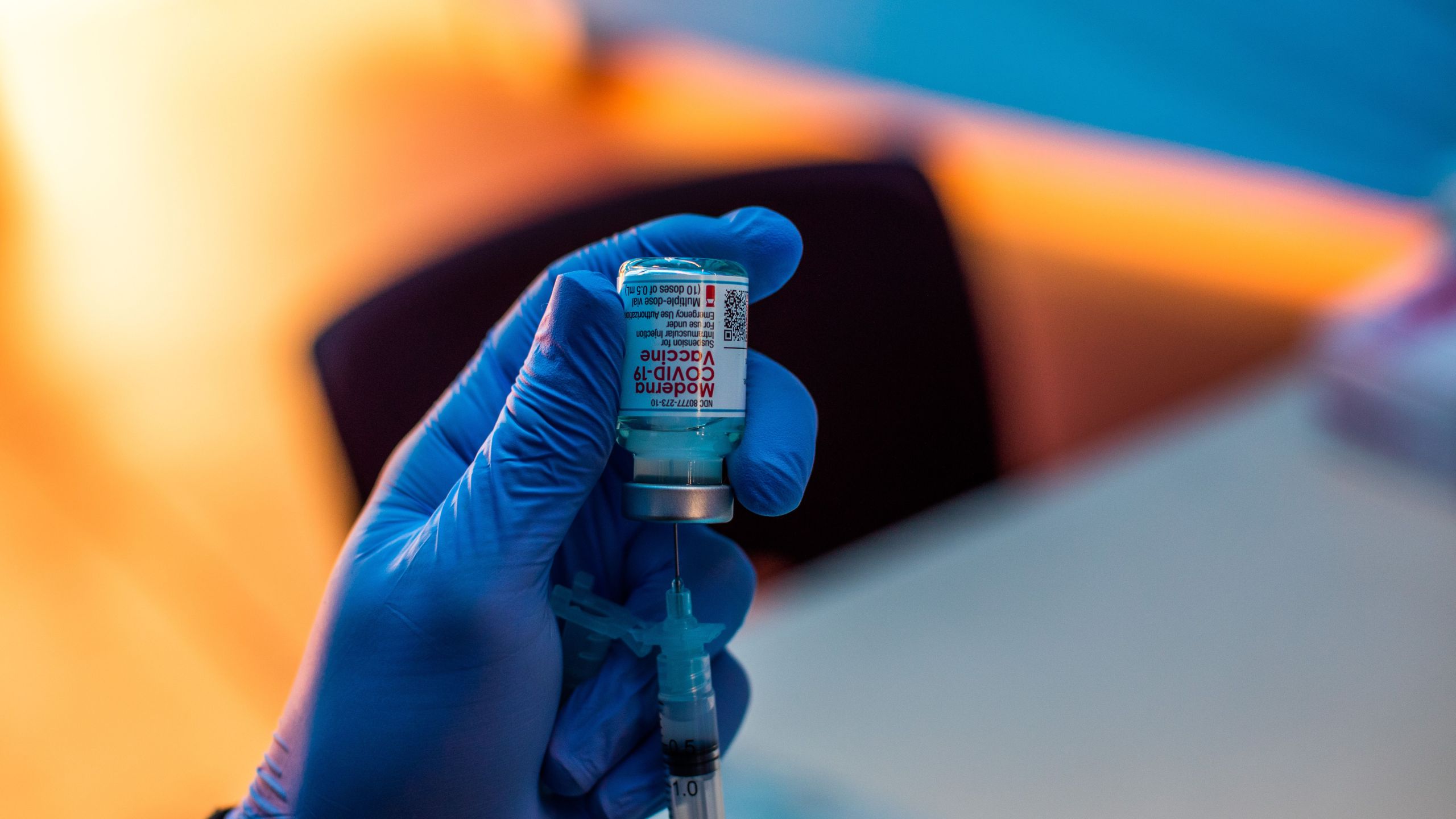 Medical workers load syringes with the Moderna Covid-19 vaccine to be administered by nurses at a vaccination site at Kedren Community Health Center, in South Central Los Angeles, California on February 16, 2021. (Apu Gomes/AFP via Getty Images)