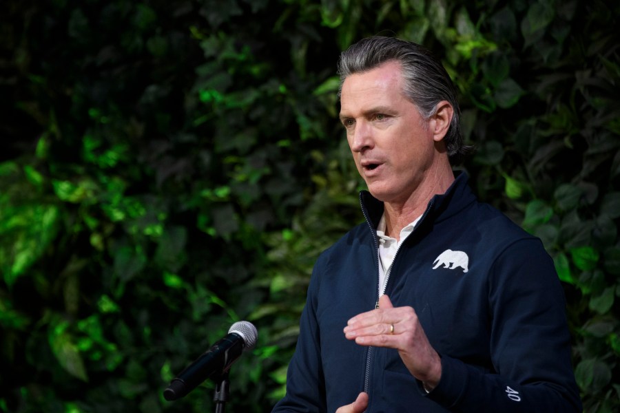 California Gov. Gavin Newsom speaks after touring a COVID-19 vaccination site in Long Beach on Feb. 22, 2021. (Patrick T. Fallon / AFP / Getty Images)