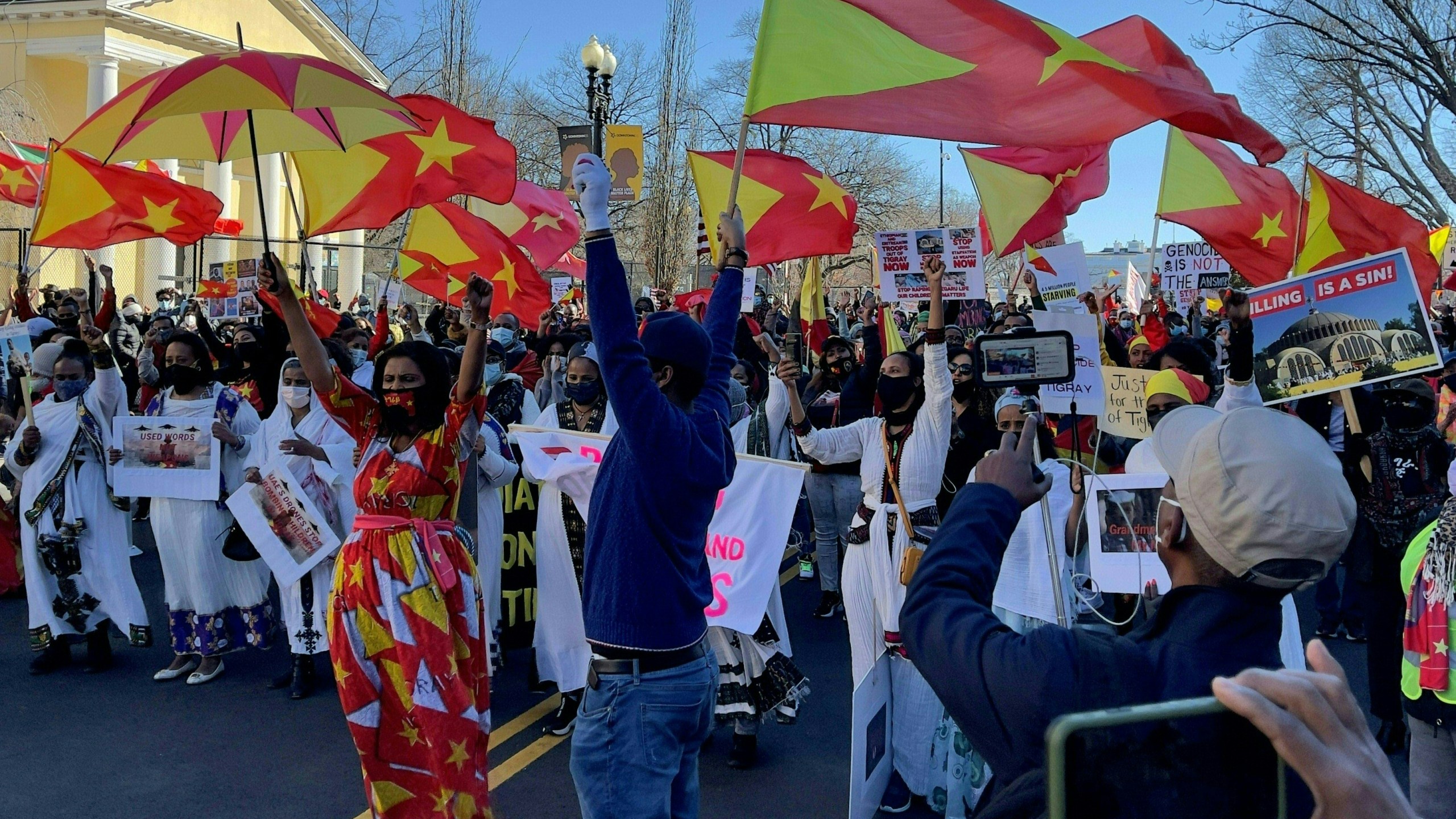 Ethiopians from Tigray region living in the U.S., gather near the White House in Washington D.C., on Feb. 25, 2021, asking for the end of the military conflict in Ethiopias Tigray region between regional forces and the Ethiopian federal army. Ethiopia's northern Tigray region has been rocked by bloody fighting since November 4, when Ethiopian Prime Minister Abiy Ahmed announced the launch of military operations there. Neighbouring Sudan, itself suffering from a severe economic crisis, was caught off-guard when the conflict broke out earlier this month. It now hosts some 36,000 Ethiopians, with many in transit camps near the border, according to Sudan's refugee commission. (Daniel SLIM / AFP via Getty Images)