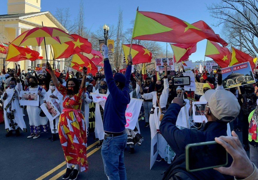 Ethiopians from Tigray region living in the U.S., gather near the White House in Washington D.C., on Feb. 25, 2021, asking for the end of the military conflict in Ethiopias Tigray region between regional forces and the Ethiopian federal army. Ethiopia's northern Tigray region has been rocked by bloody fighting since November 4, when Ethiopian Prime Minister Abiy Ahmed announced the launch of military operations there. Neighbouring Sudan, itself suffering from a severe economic crisis, was caught off-guard when the conflict broke out earlier this month. It now hosts some 36,000 Ethiopians, with many in transit camps near the border, according to Sudan's refugee commission. (Daniel SLIM / AFP via Getty Images)