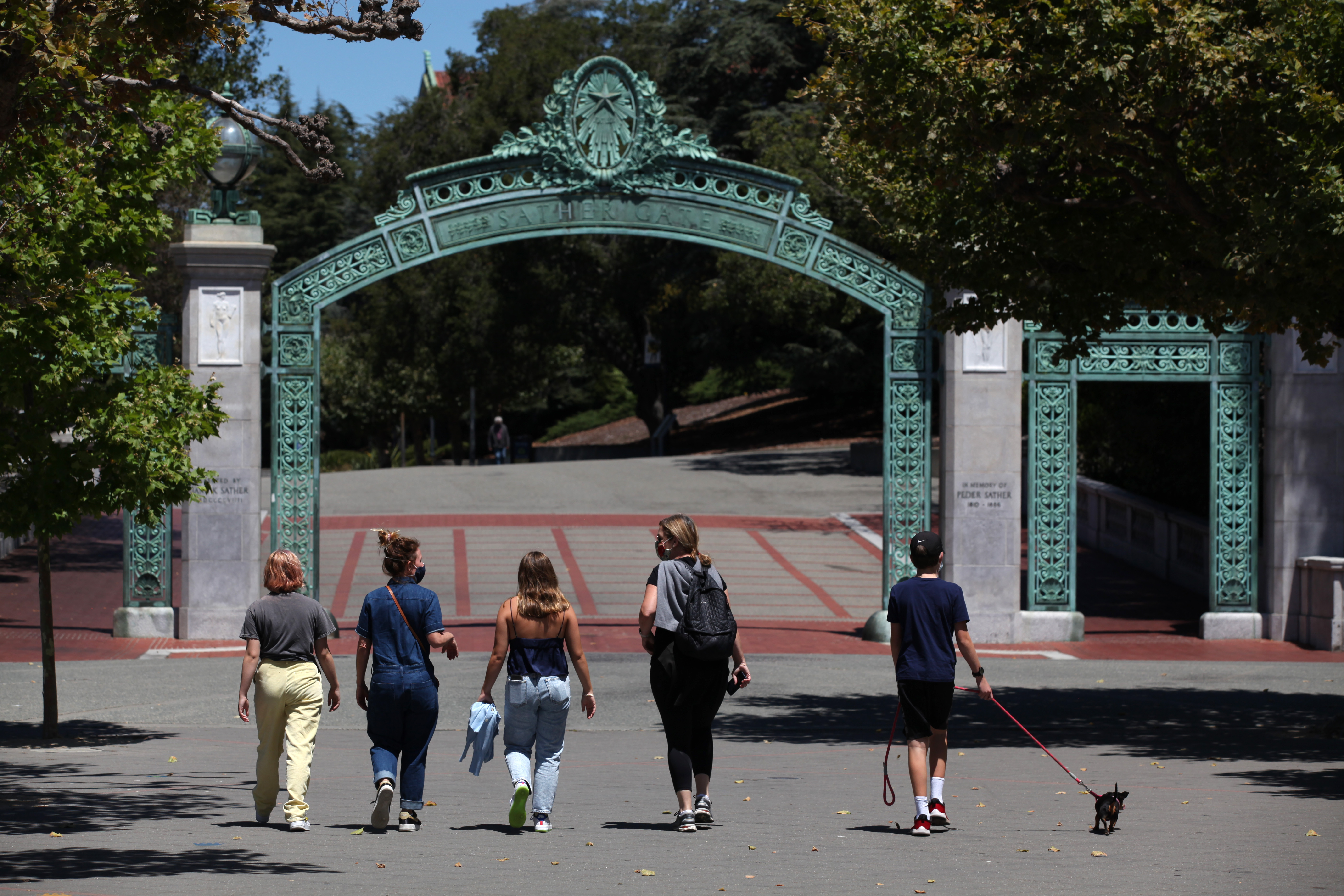 People walk towards Sather Gate on the U.C. Berkeley campus on July 22, 2020 in Berkeley, California. (Justin Sullivan/Getty Images)