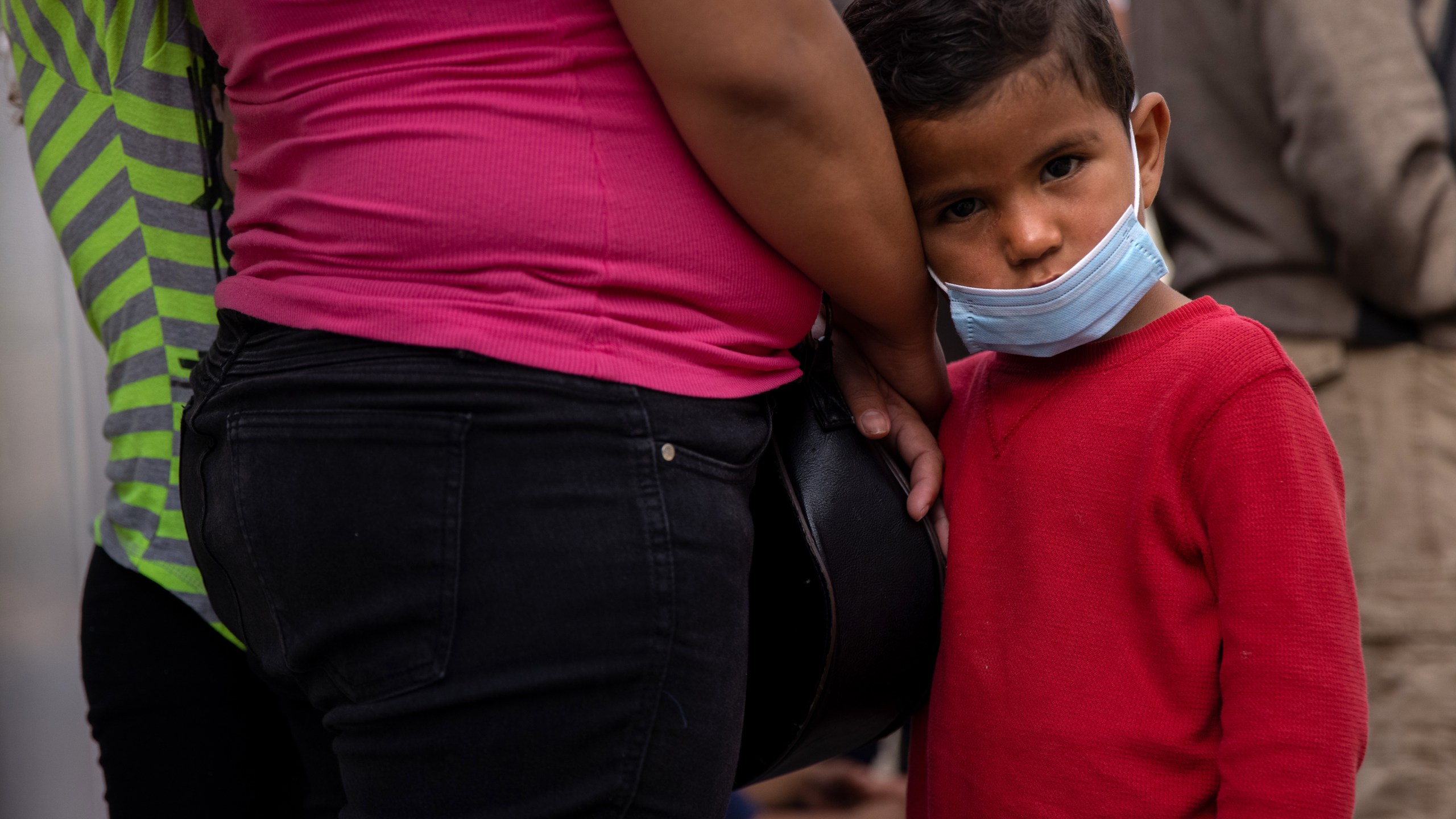 Honduran asylum seekers wait to register at a migrant camp at the U.S.-Mexico border on February 23, 2021 in Matamoros, Mexico. (John Moore/Getty Images)