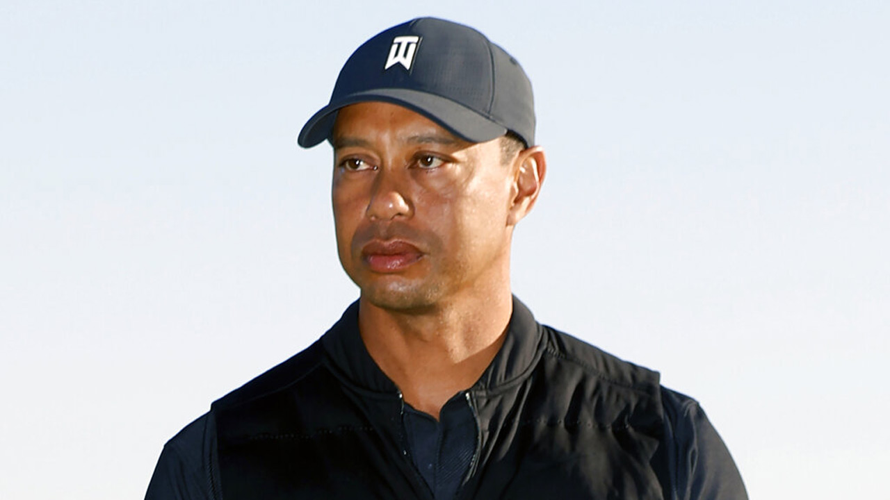 Tiger Woods looks on during a trophy ceremony at the Genesis Invitational golf tournament at Riviera Country Club on Feb. 21, 2021, in the Pacific Palisades area of Los Angeles. (AP Photo/Ryan Kang)