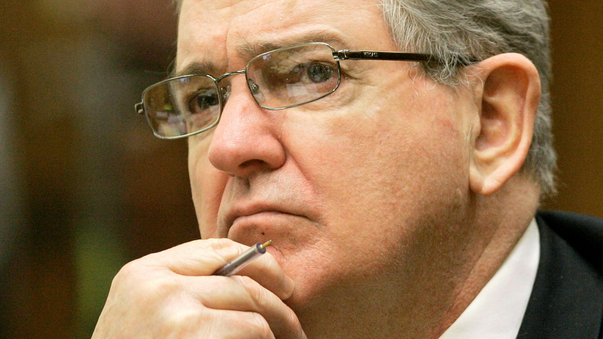 In this Oct. 15, 2008 file photo, former FBI agent John Connolly listens to the testimony during his trial in Miami. (AP Photo/Alan Diaz, File)