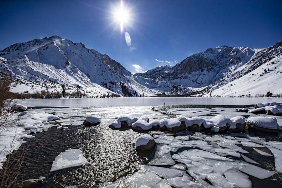 Ice breaks up at the mouth of Convict Creek overlooking Convict Lake and the Sierra Nevada range near Mammoth Lakes.(Brian van der Brug / Los Angeles Times)