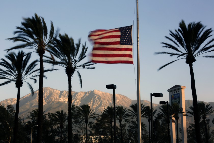 In this file photo, Santa Ana winds whip a flag in Fontana.(Irfan Khan / Los Angeles Times)