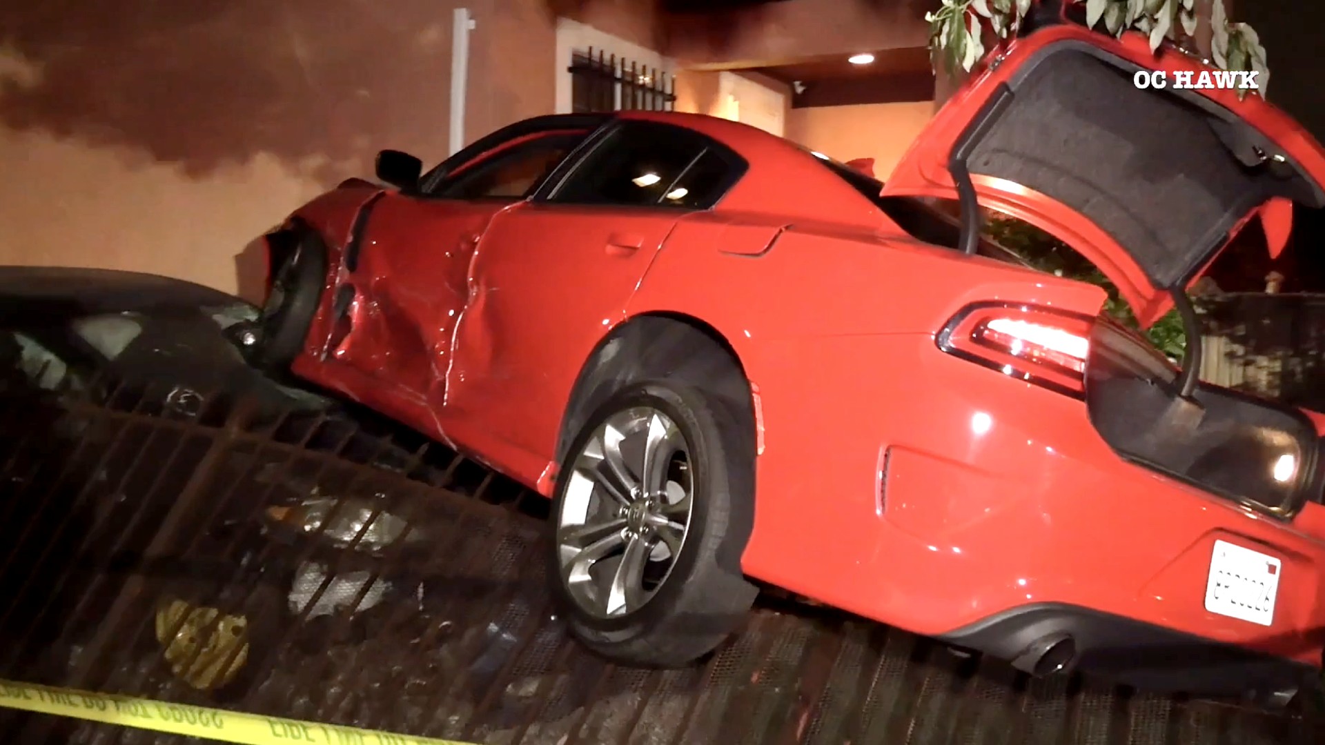 One of the damaged cars is seen following a hit-and-run crash in South Los Angeles on Feb. 15, 2021. (OC Hawk)