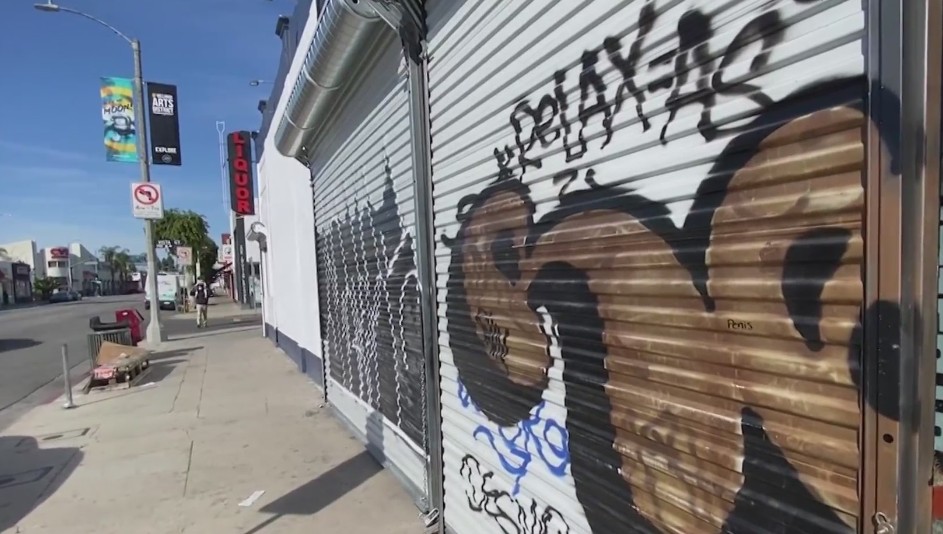 Stores along Melrose Avenue in L.A.'s Fairfax District are seen closed on Feb. 16, 2021. A day earlier, police warned of a recent crime spike in the area. (KTLA)