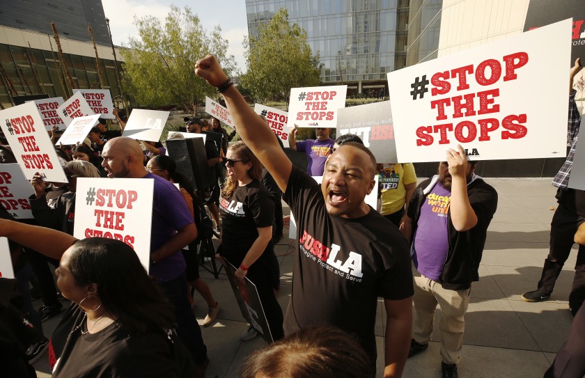 Activists outside LAPD headquarters in 2019 call for an end to LAPD traffic stops in Black and Latino neighborhoods. (Al Seib / Los Angeles Times)