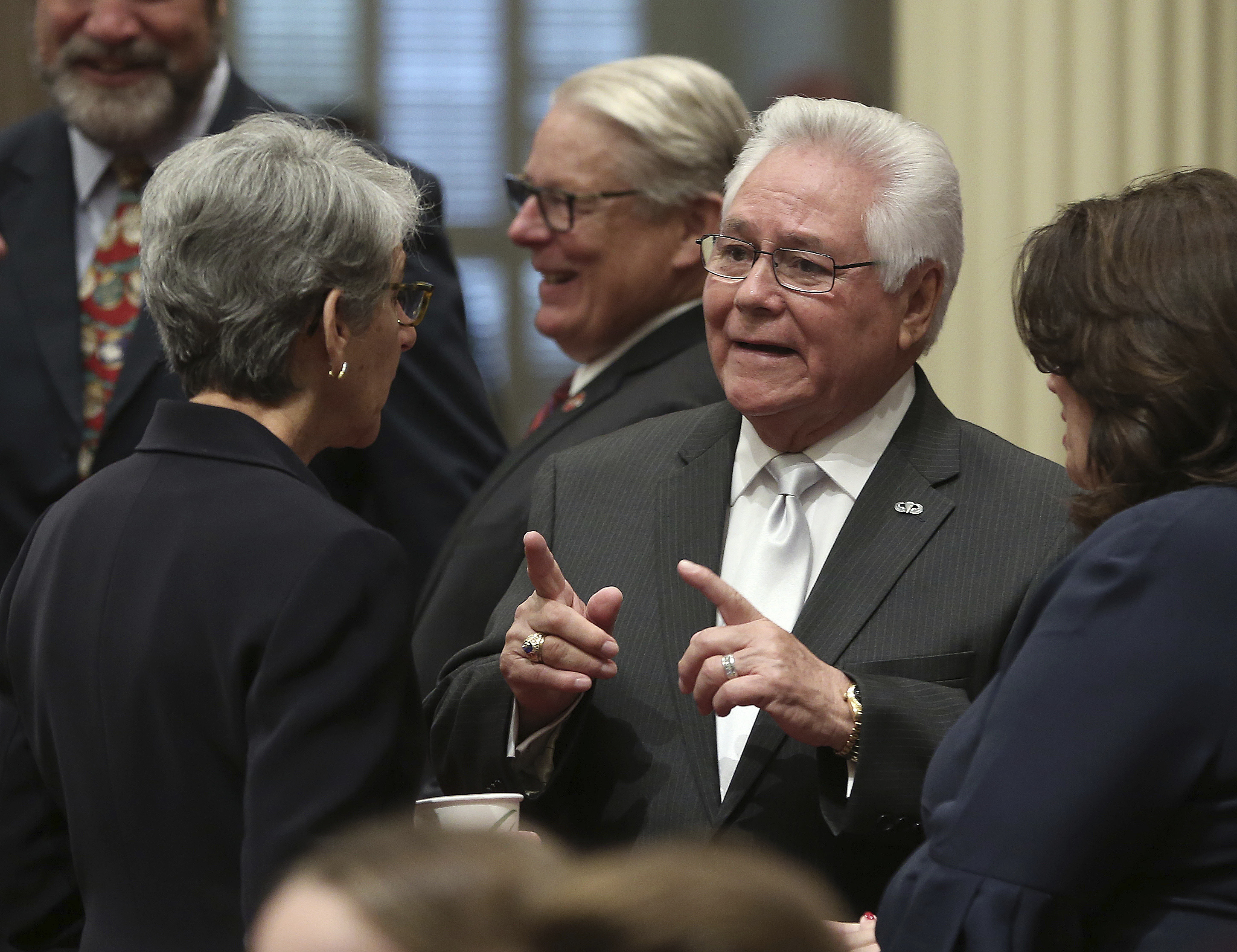 Freshman state Sen. Bob Archuleta, D-Pico Rivera, talks with Sen. Hannah-Beth Jackson, D-Santa Barbara, left, during the state Senate session on Dec. 3, 2018 in Sacramento. (Rich Pedroncelli/Associated Press)