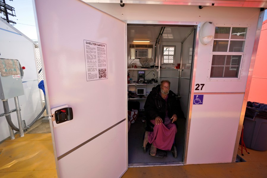 Tiffany sits inside a tiny home on Feb. 25, 2021, in North Hollywood. (AP Photo/Marcio Jose Sanchez)