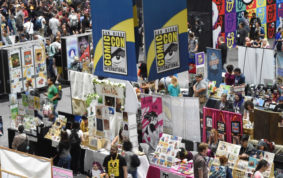 Comic-Con attendees walk the convention center floor during preview night at Comic-Con International on July 17, 2019, in San Diego, Calif. (Chris Pizzello/Invision/AP)