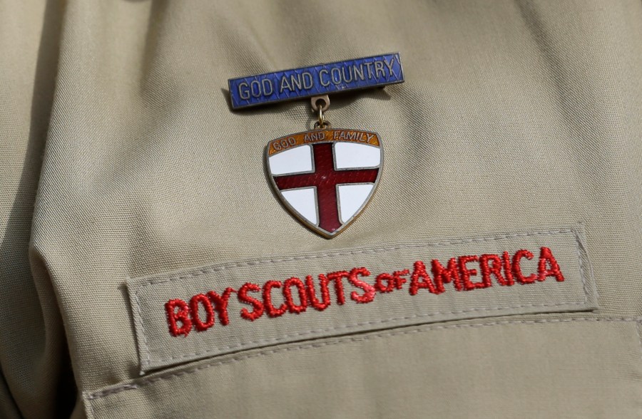 A detail of a Boy Scout uniform is seen during a news conference in front of the Boy Scouts of America headquarters in Irving, Texas, on Feb. 4, 2013. (Tony Gutierrez / Associated Press)