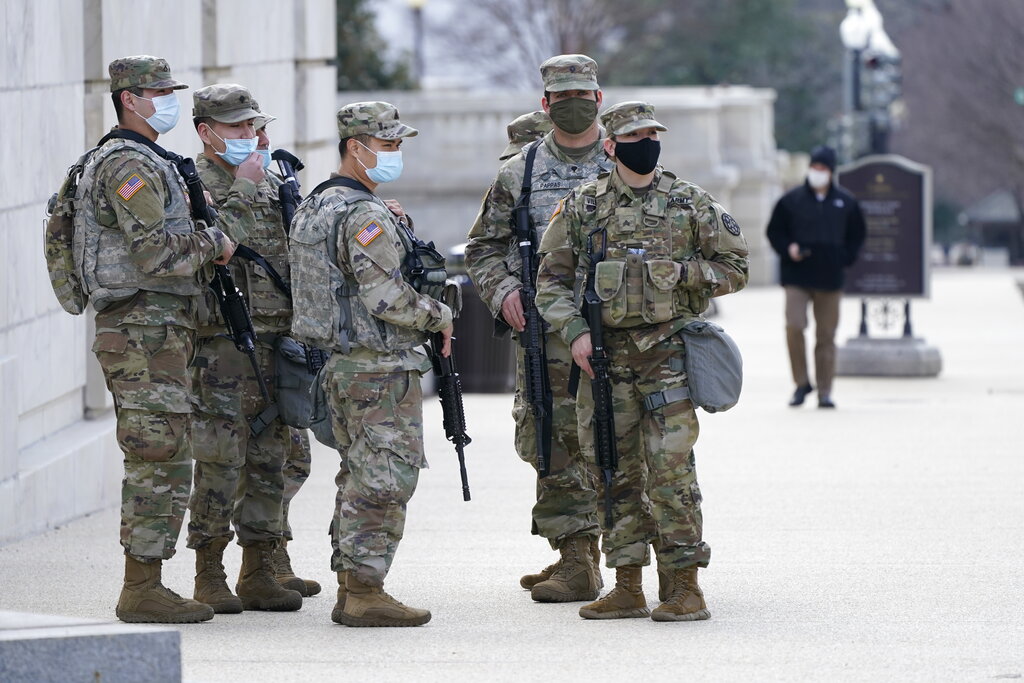 National Guard keep watch on the Capitol, Thursday, March 4, 2021, on Capitol Hill in Washington. (AP Photo/Jacquelyn Martin)