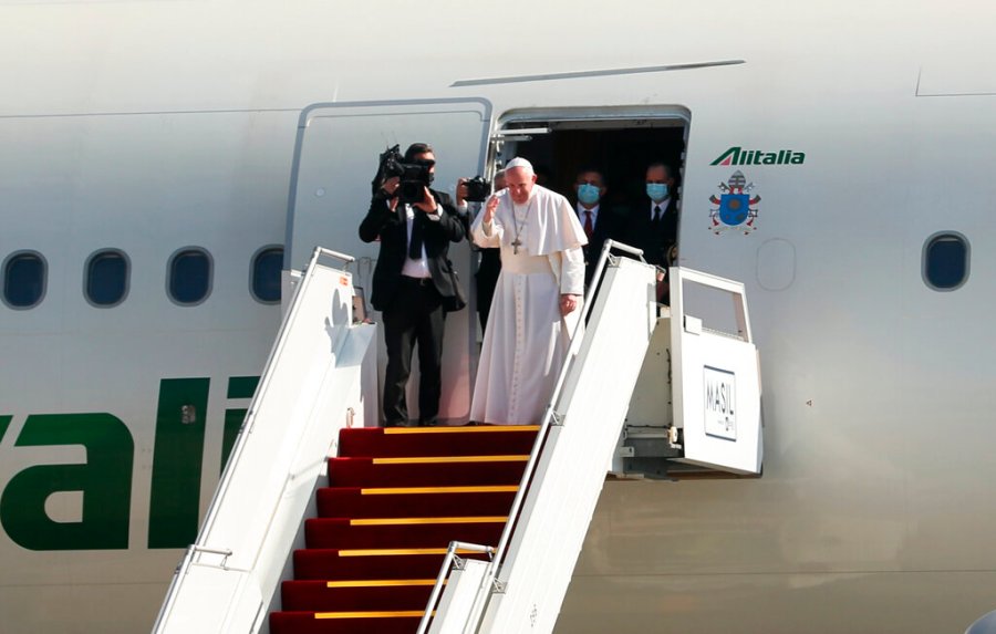 Pope Francis, font right, bids farewell upon concluding his visit to Iraq at Baghdad airport, Iraq, Monday, March 8, 2021. (AP Photo/Khalid Mohammed)