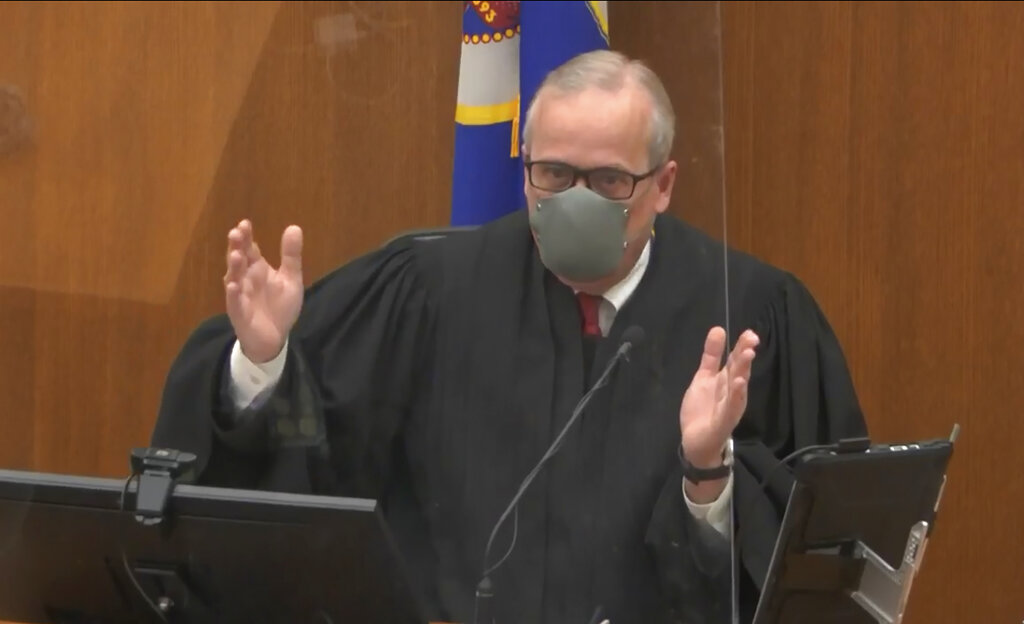 In this image from video, Hennepin County Judge Peter Cahill presides over pretrial motions before jury selection, Monday, March 8, 2021, in the trial of former Minneapolis police officer Derek Chauvin, in the May 25, 2020, death of George Floyd at the Hennepin County Courthouse in Minneapolis, Minn. (Court TV via AP, Pool)