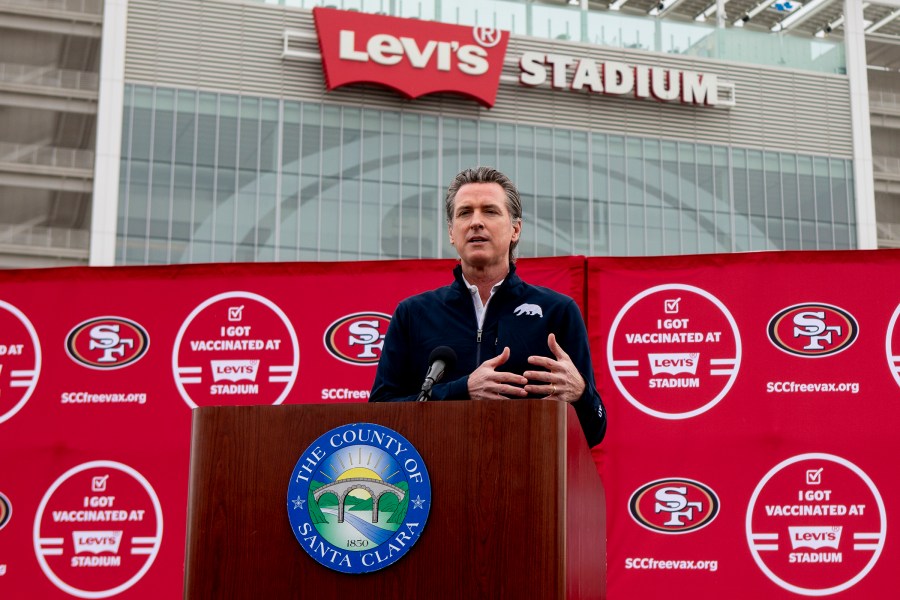 In this Feb. 9, 2021, file photo, California Gov. Gavin Newsom speaks at a press conference outside of Levi's Stadium, in Santa Clara, Calif., before the opening of the largest mass coronavirus vaccination site in the state. (Karl Mondon/Bay Area News Group via AP, File)