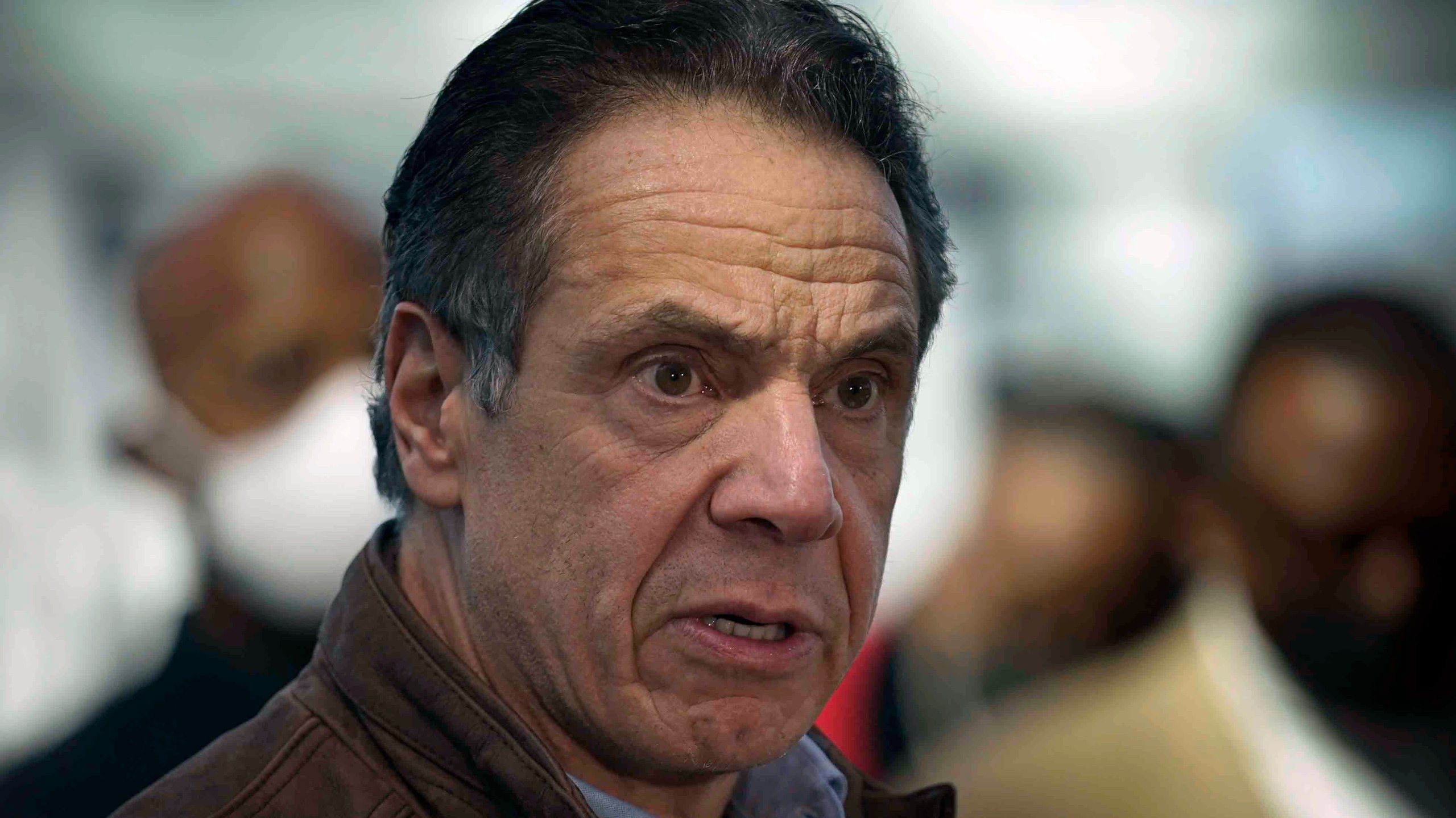 This Monday, March 8, 2021, file photo shows New York Gov. Andrew Cuomo speaking at a vaccination site in New York. A sixth woman has come forward alleging that Cuomo inappropriately touched her late last year, during an encounter at the governor's mansion. (AP Photo/Seth Wenig, Pool, File)