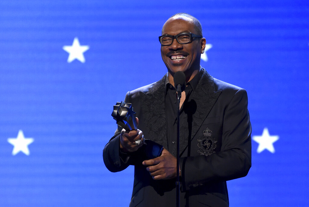 In this Jan. 12, 2020, file photo, Eddie Murphy accepts the lifetime achievement award at the 25th annual Critics' Choice Awards in Santa Monica, Calif. (AP Photo/Chris Pizzello, File)