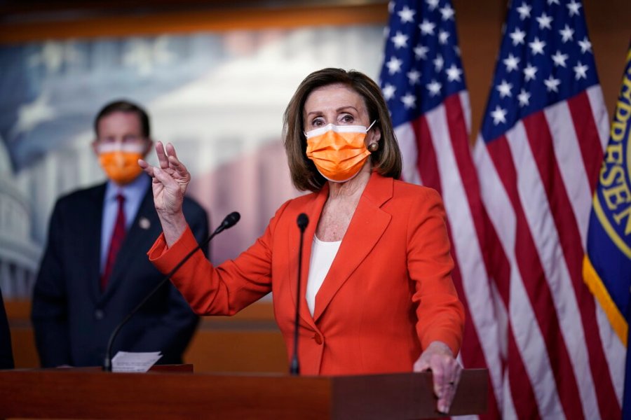 Speaker of the House Nancy Pelosi, D-Calif., holds a news conference on passage of gun violence prevention legislation, at the Capitol in Washington, Thursday, March 11, 2021, as Sen. Richard Blumenthal, D-Conn., looks on. (AP Photo/J. Scott Applewhite)