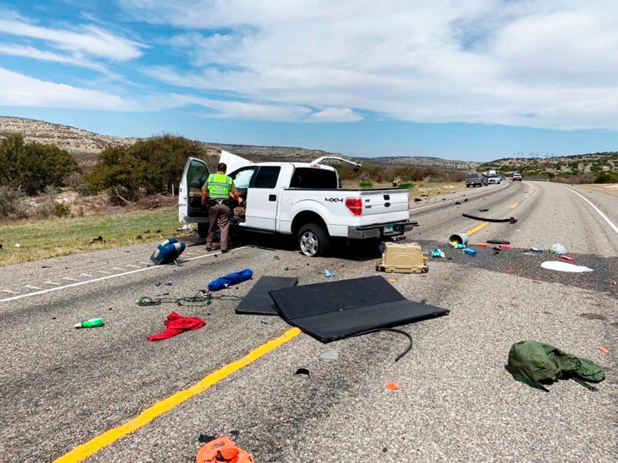 Debris is strewn across a road near the border city of Del Rio, Texas after a collision Monday, March 15, 2021. (Texas Department of Public Safety via AP)