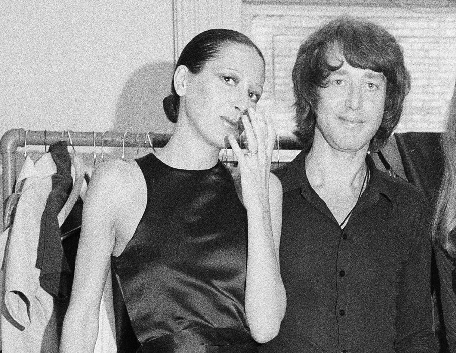 Elsa Peretti, left, poses with designer Halston after a fashion show in New York on June 15, 1970. (AP Photo/Marty Lederhandler, File)