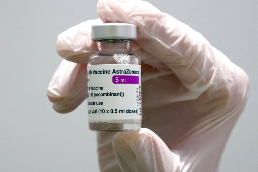 In this Monday, March 22, 2021 file photo medical staff prepares an AstraZeneca coronavirus vaccine during preparations at the vaccine center in Ebersberg near Munich, Germany. (AP Photo/Matthias Schrader, File)