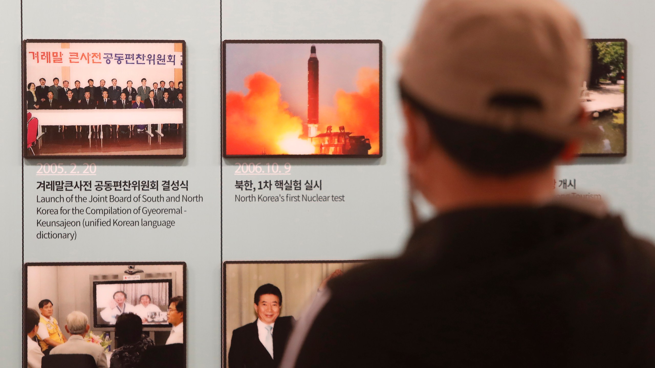 A photo showing North Korea's missile launch is displayed at the Unification Observation Post in Paju, South Korea, near the border with North Korea, on March 24, 2021. (Ahn Young-joon / Associated Press)