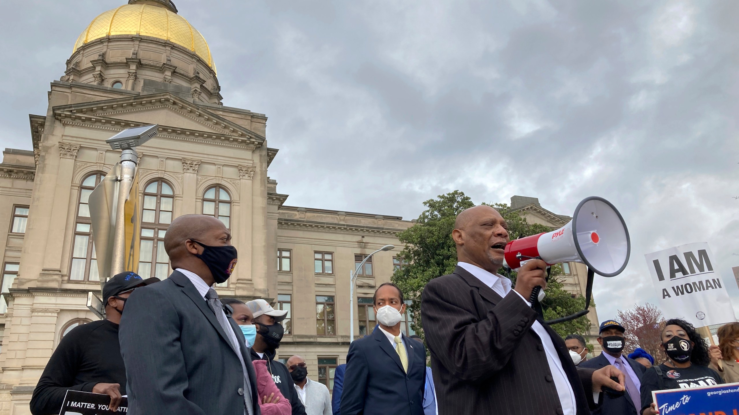 African Methodist Episcopal Church Bishop Reginald Jackson announces a boycott of Coca-Cola Co. products outside the Georgia Capitol on Thursday, March 25, 2021 in Atlanta. Jackson says Coca-Cola and other large Georgia companies haven't done enough to oppose restrictive voting bills that Georgia lawmakers were debating as Jackson spoke. (Jeff Amy/Associated Press)