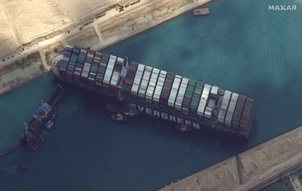 This satellite image from Maxar Technologies shows the cargo ship MV Ever Given stuck in the Suez Canal near Suez, Egypt, Friday, March 26, 2021.(©Maxar Technologies via AP)