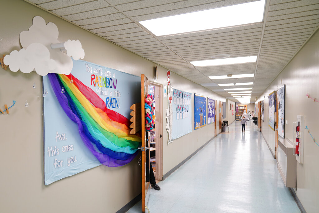 A memorial dedicated to former student Ava Lerario is posted in a hallway at Panther Valley Elementary School, Thursday, March 11, 2021, in Nesquehoning, Pa. (AP Photo/Matt Slocum)