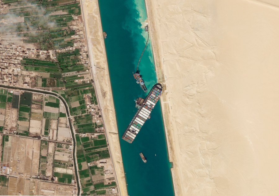 In this March 28, 2021, satellite file image from Planet Labs Inc, the cargo ship MV Ever Given sits stuck in the Suez Canal near Suez, Egypt. (Planet Labs Inc. via AP)