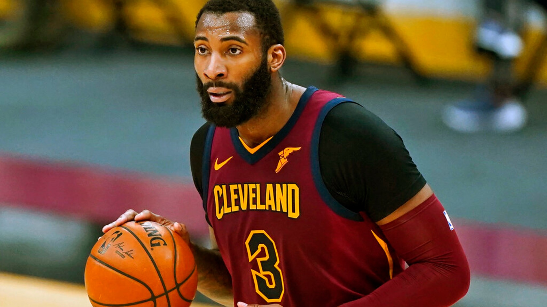 In this Feb 5, 2021, file photo, Cleveland Cavaliers' Andre Drummond drives the second half of an NBA basketball game against the Milwaukee Bucks in Cleveland. (AP Photo/Tony Dejak, File)