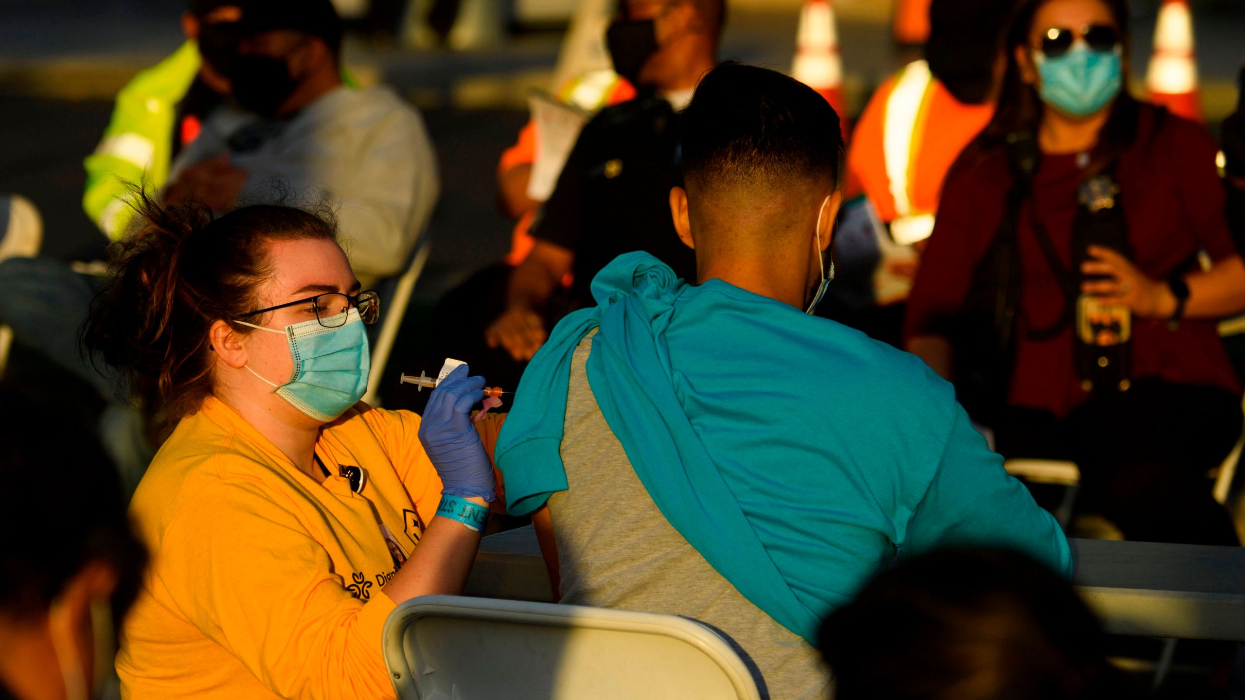 A nurse administers a dose of the Moderna COVID-19 vaccine at a vaccination site at Dignity Health Sports Park on Feb. 6, 2021, in Carson, California. (PATRICK T. FALLON/AFP via Getty Images)