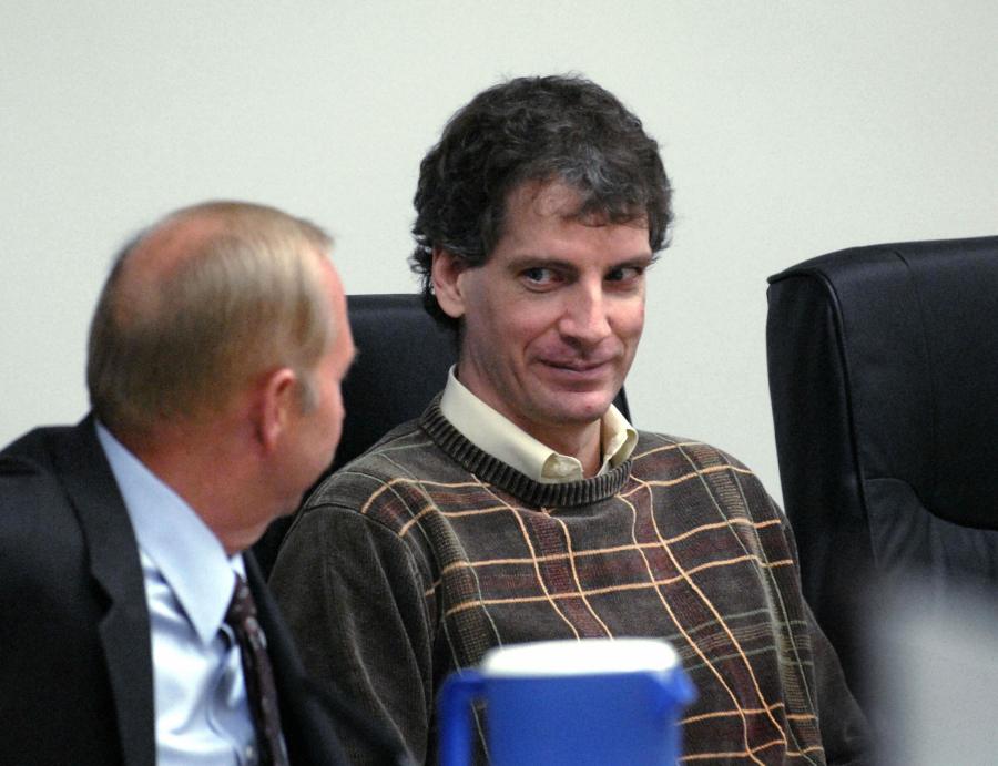 Joseph Edward Duncan III (R), listens to his Public Defender John Adams (L), during a plea agreement and sentencing hearing in the court room of the Kootenai County Jail 16 October, 2006 in Coeur d' Alene, Idaho. Duncan plead guilty to the murder and kidnapping of Mark McKenzie, Brenda Groene, and Slade Groene at their home near Coeur d' Alane in May 2005. Duncan was sentenced to three consecutive life sentences, without parole, on the kidnapping charges and still faces the death penality pending charges of murder and kidnapping in a federal case that involves Dylan and Shasta Groene. (KATHY PLONKA/AFP via Getty Images)