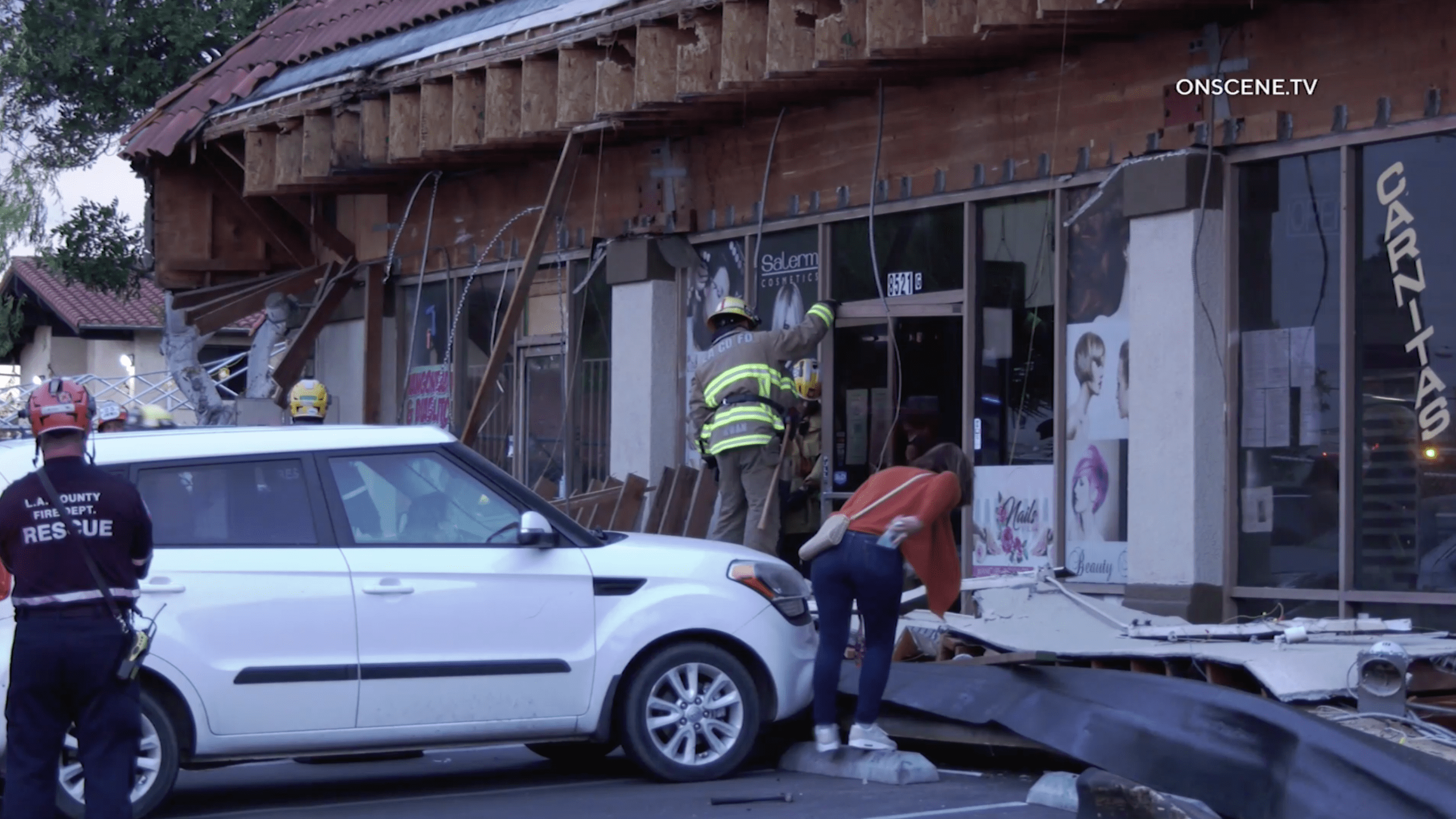 Authorities respond after a strip mall's facade collapsed in West Whittier on March 12, 2021. (OnScene.TV)