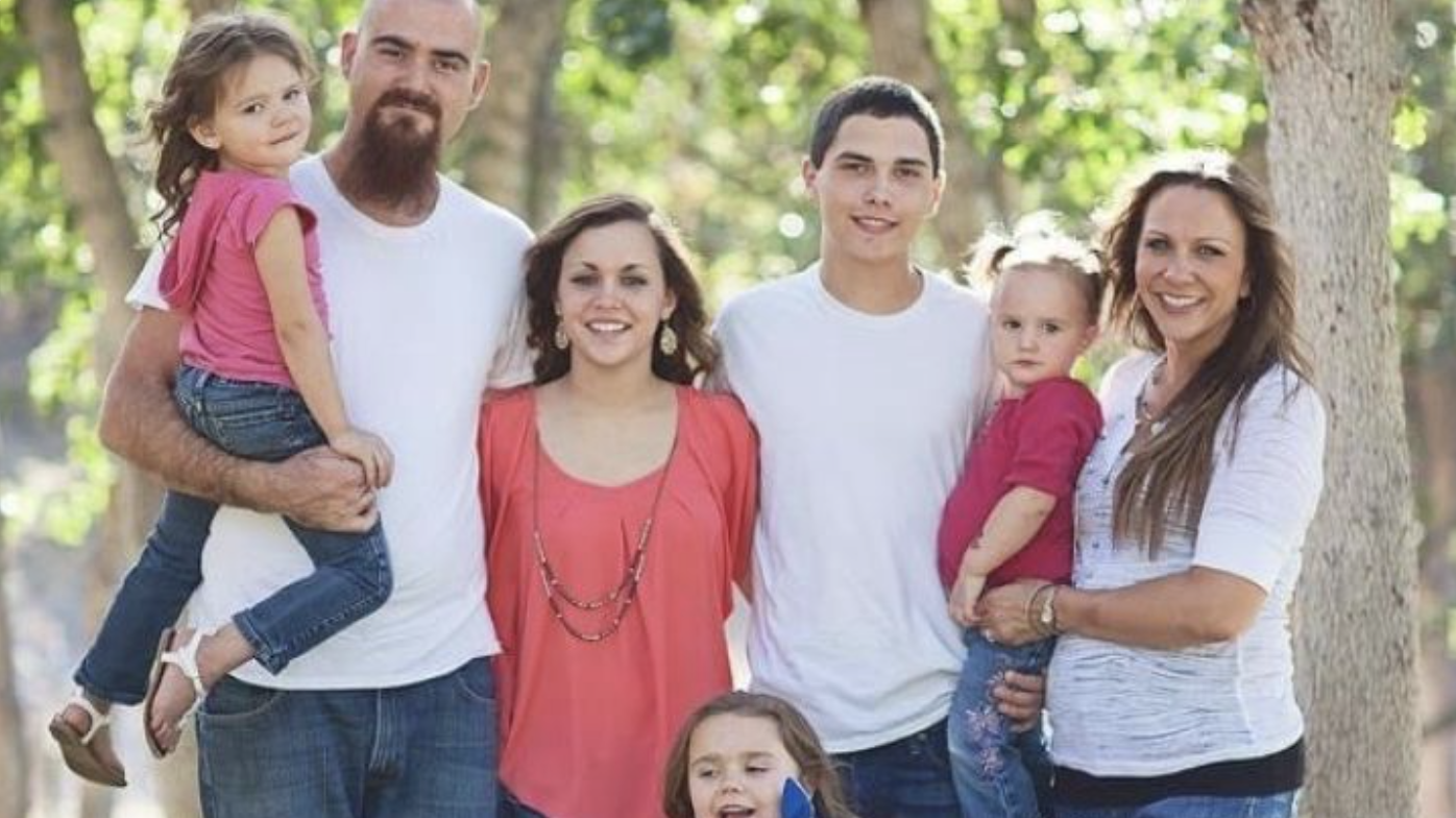 Jessica and Jake Woodruff are surrounded by their children in an undated photo posted to a GoFundMe page.