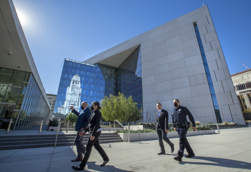 LAPD officials walk past the agency's headquarters in downtown Los Angeles in this undated photo. (Mel Melcon / Los Angeles Times)