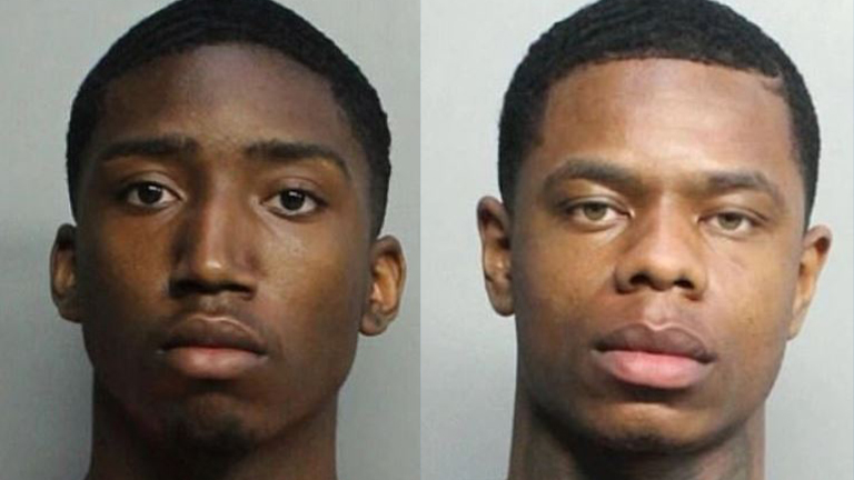 Evoire Collier and Dorian Taylor are seen in booking photos released by the Miami Beach Police Department.