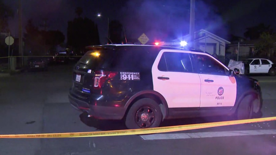 Authorities respond to the scene where an assault with a deadly weapon suspect was shot by police in Watts on March 16, 2021. (KTLA)