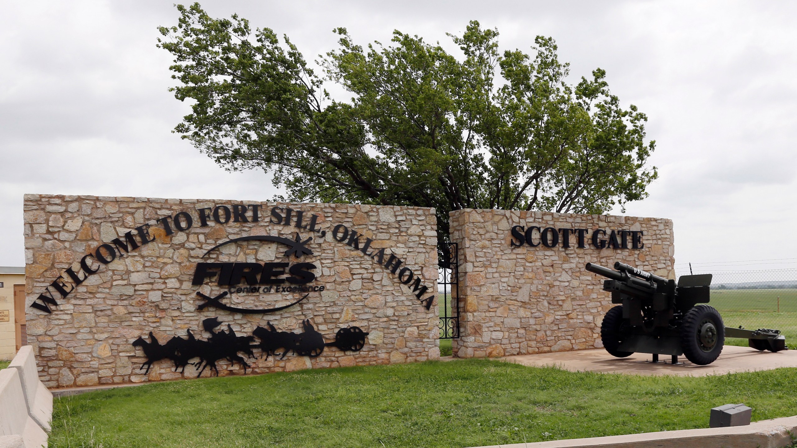 This June 17, 2014 file photo shows an entrance to Fort Sill near Lawton, Okla. (AP Photo/Sue Ogrocki, File)