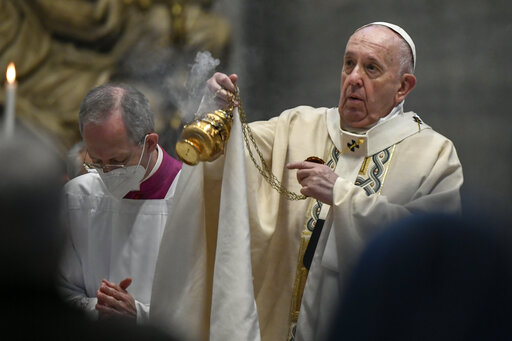 Pope Francis celebrates Easter Mass at St. Peter's Basilica at The Vatican Sunday, April 4, 2021, during the Covid-19 coronavirus pandemic. (Filippo Monteforte/Pool photo via AP)