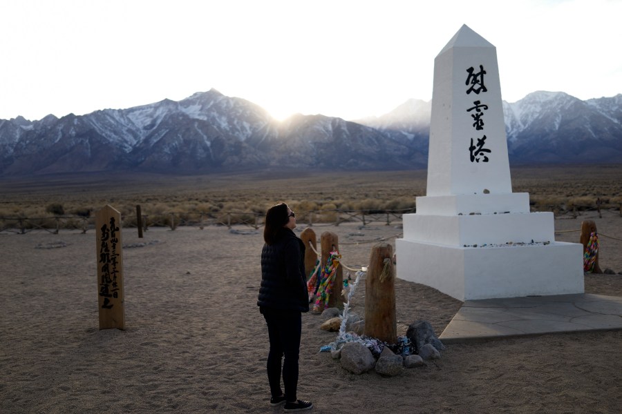 Lori Matsumura visits the cemetery at the Manzanar National Historic Site near Independence, Calif., on Feb. 17, 2020. (Brian Melley / Associated Press)