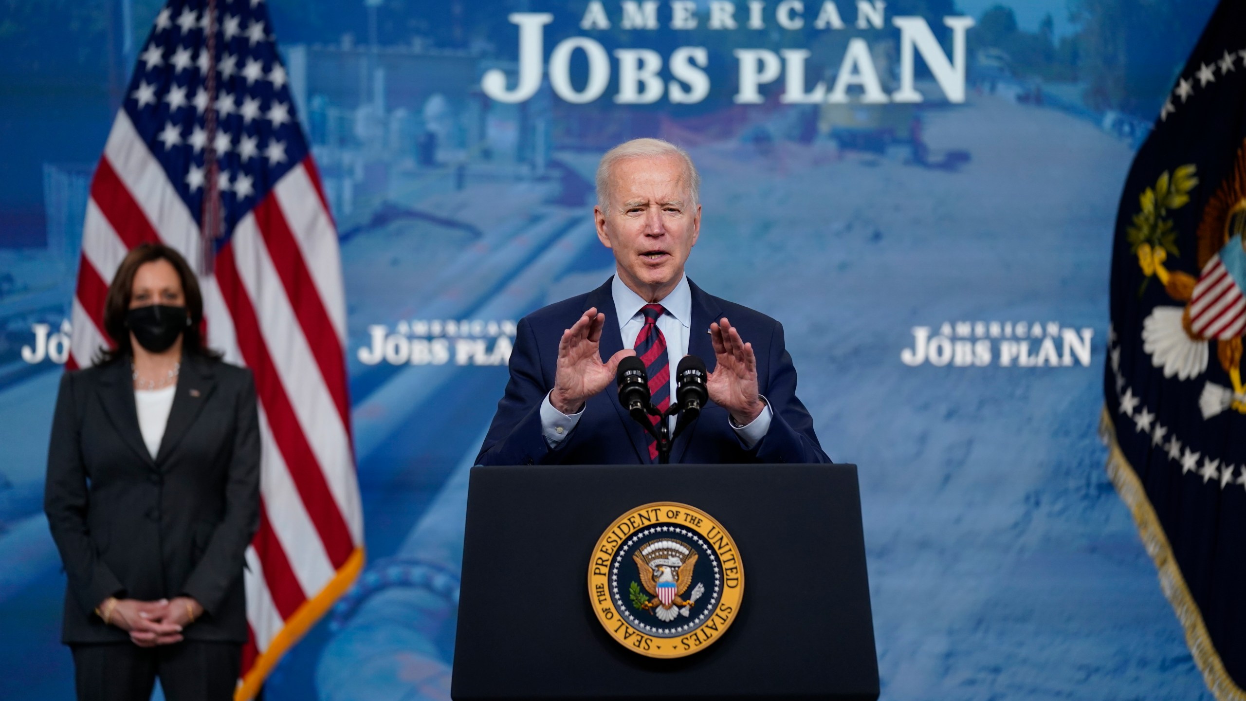 President Joe Biden speaks during an event on the American Jobs Plan in the South Court Auditorium on the White House campus, Wednesday, April 7, 2021, in Washington. Vice President Kamala Harris is at left. (AP Photo/Evan Vucci)