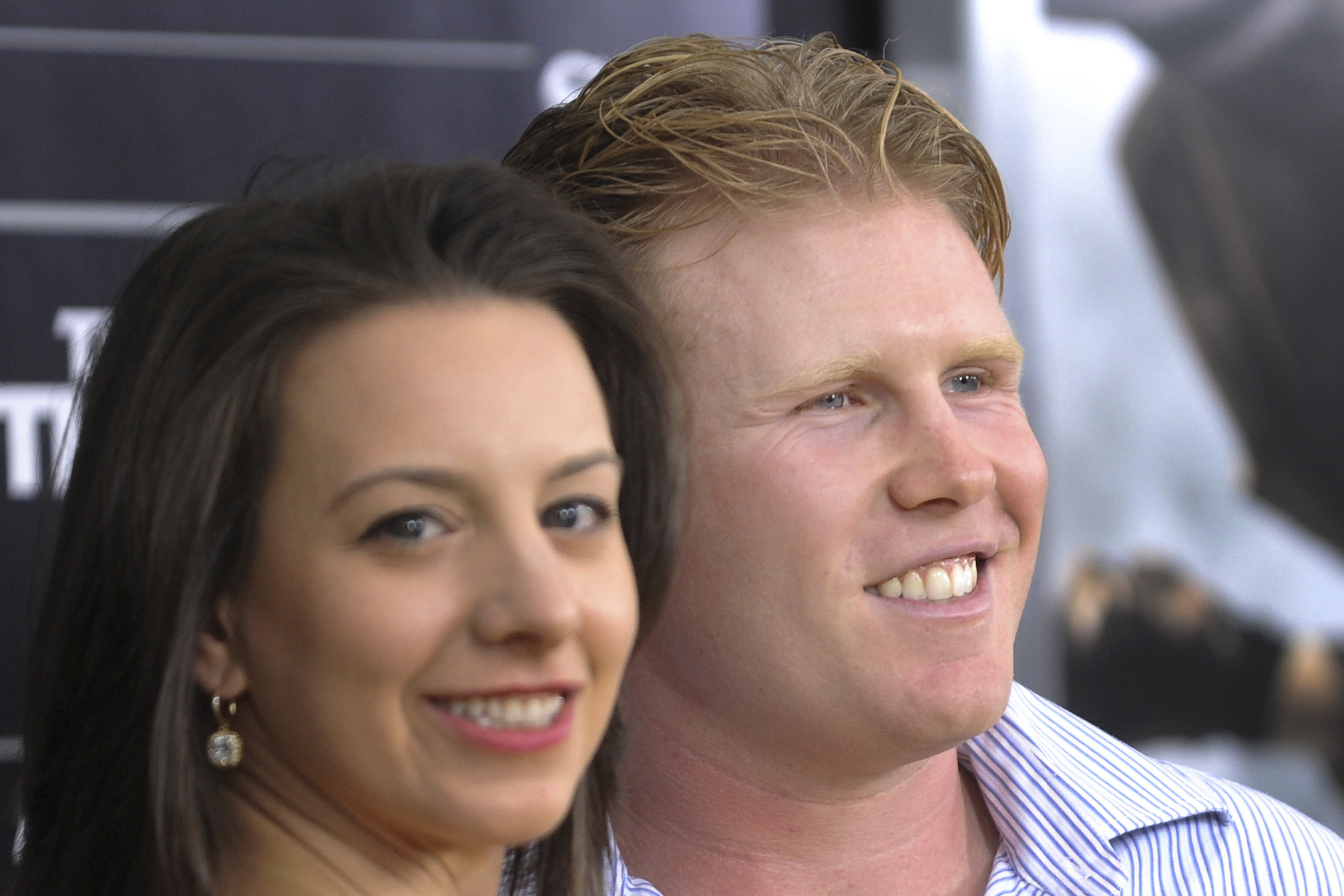 In this Aug. 2, 2010, file photo, Andrew Giuliani, right, son of former New York City Mayor Rudy Giuliani, attends the world premiere of "The Other Guys" with former Olympic figure skater Sarah Hughes at the Ziegfeld Theatre in New York. (Evan Agostini/Associated Press)